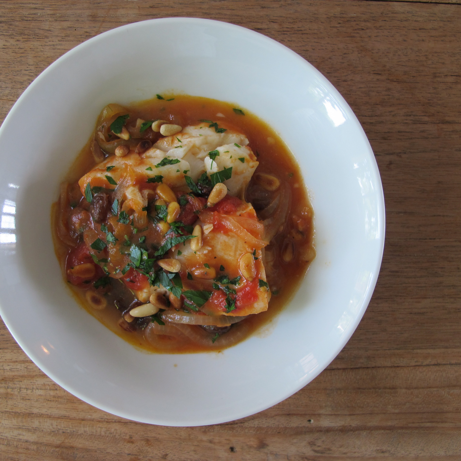 Cod with Tomatoes, Pine Nuts & Raisins