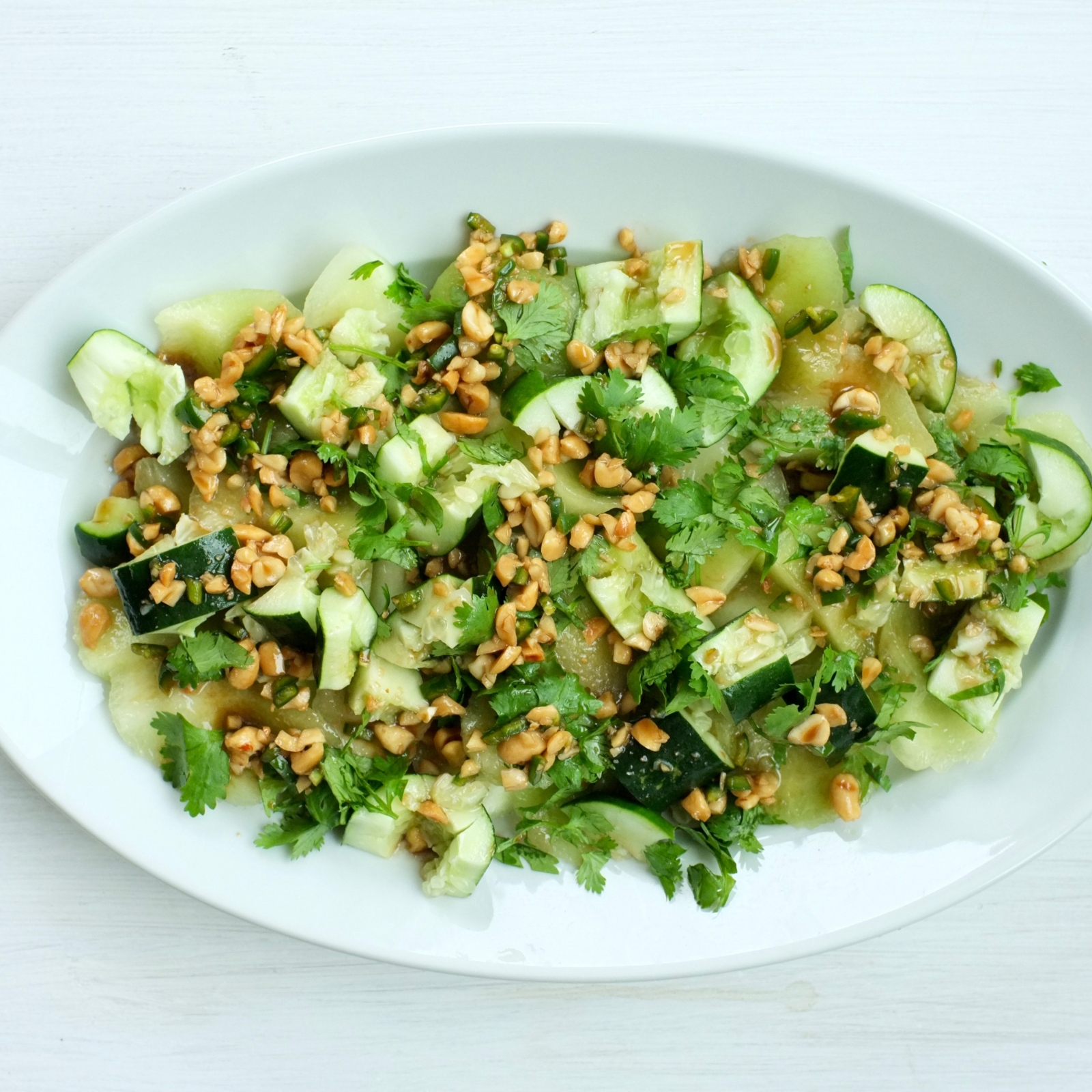 Cool Cucumber and Honeydew Salad with Spicy Peanut Dressing