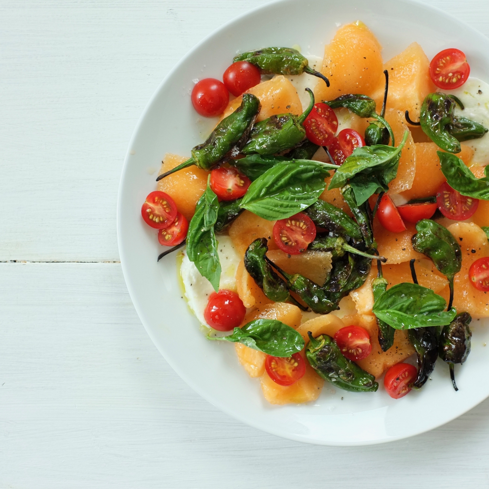 Tomato Mozzarella Salad with Cantaloupe and Charred Shishitos