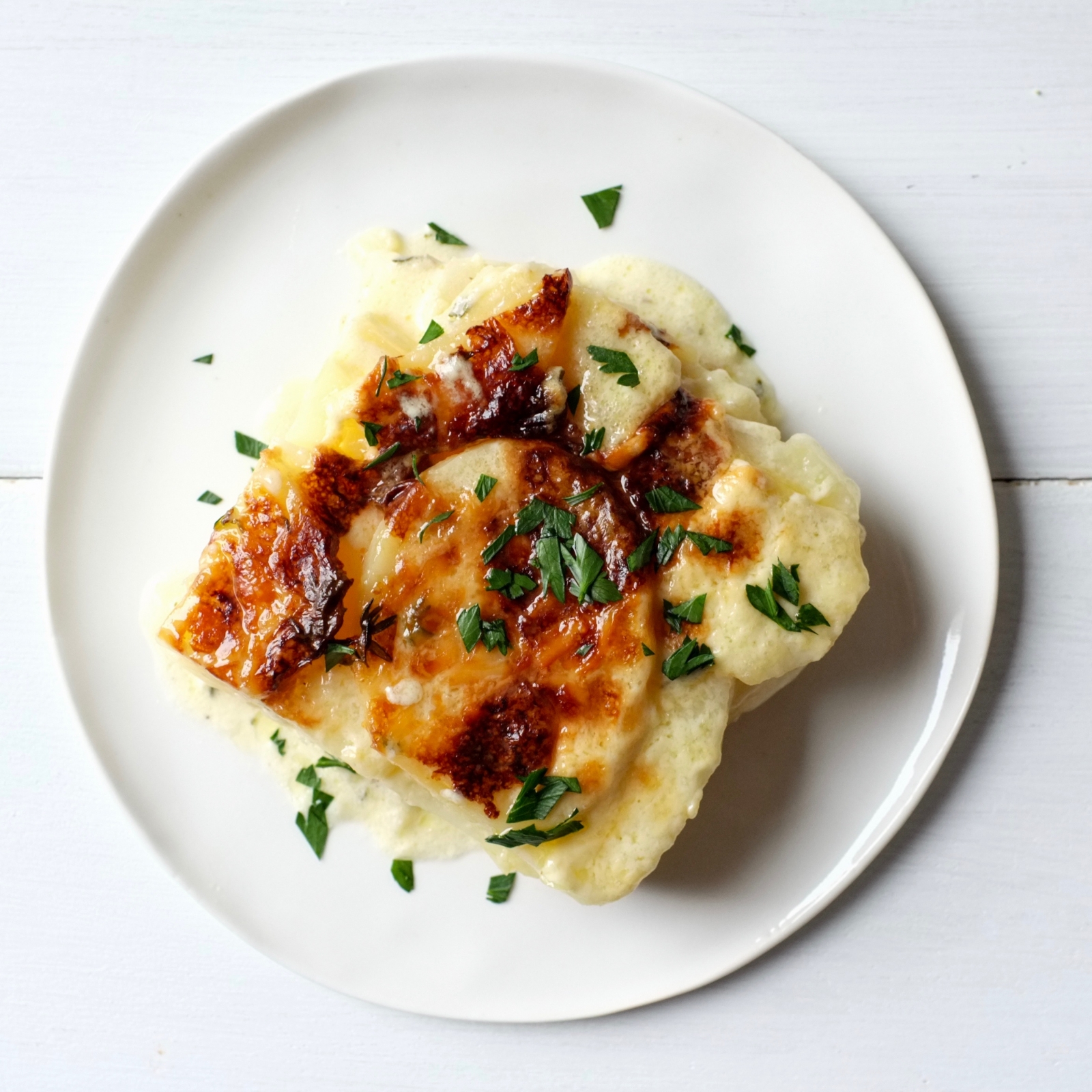 Creamy Scalloped Potatoes with Gruyere and Thyme