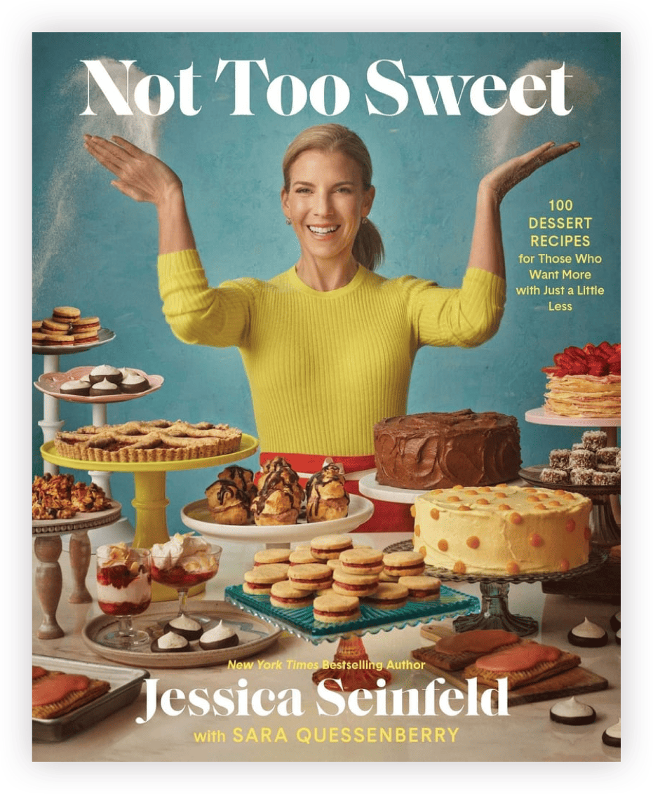 Not Too Sweet book cover featuring Jessica Seinfeld throwing sugar while surrounded by cakes, cookies, and other desserts